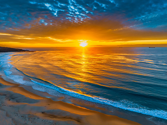 Sunrise at the seaside with beautiful cloudcover