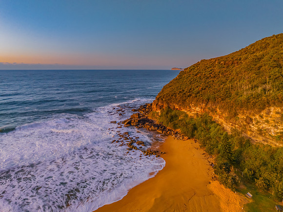 Sunrise and waves at the seaside