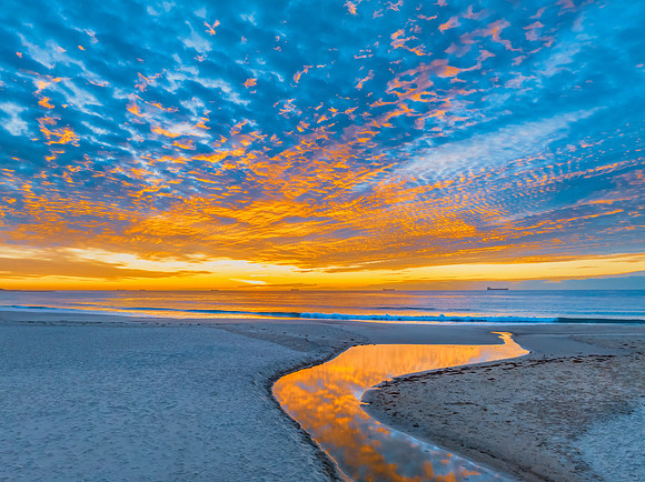 Sunrise at the seaside with beautiful cloudcover