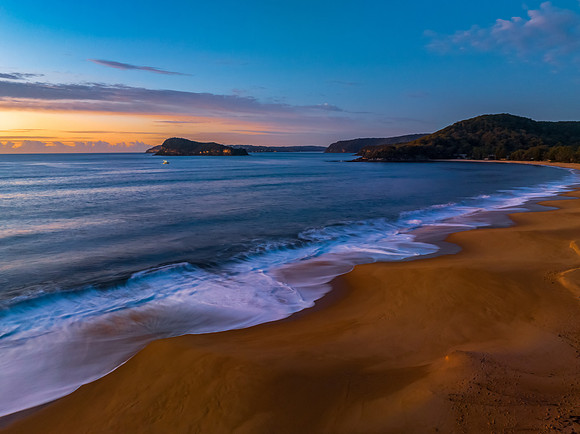 Aerial sunrise seascape with high cloud