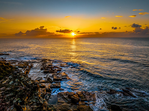 Sunrise sea views and rocky inlet