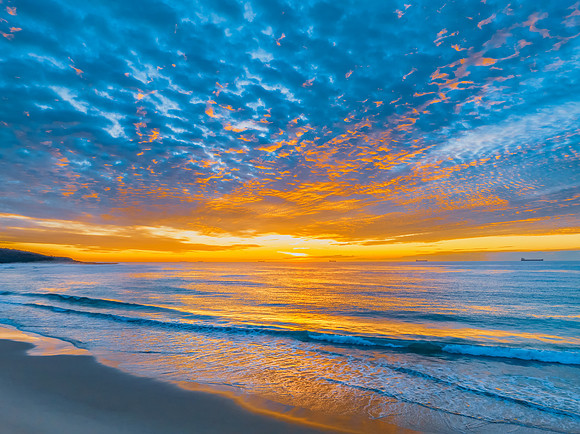 Sunrise at the seaside with beautiful cloudcover