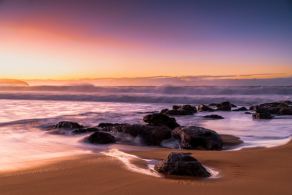 Sunrise and Waves - Surf's up at the seaside