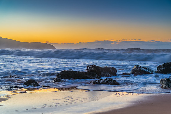 Sunrise and Waves - Surf's up at the seaside