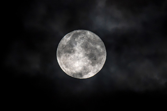 Cloud‑Covered Night Sky and the Full Moon