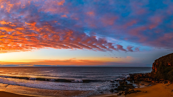 Winter seascape views over the beach with high and medium cloud