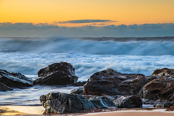 Sunrise and Waves - Surf's up at the seaside