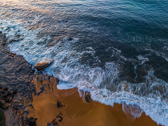 Top down morning view of the sea and rock platform