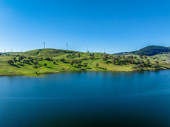 Aerial scenic views over Carcoar Dam with blue sky
