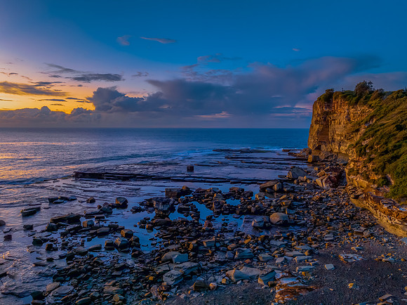 Sunrise sea views and rocky inlet