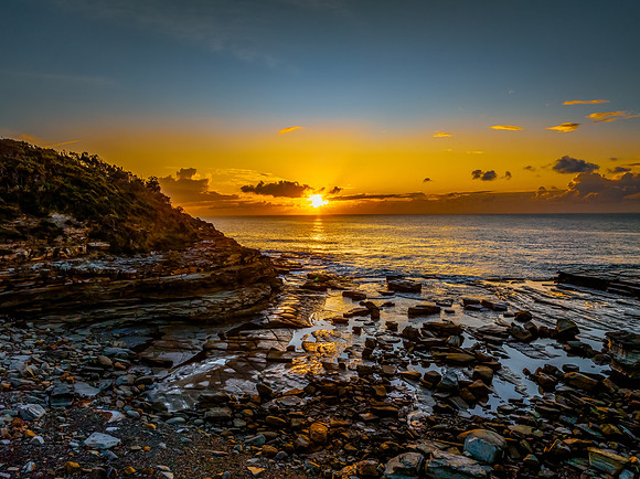Sunrise sea views and rocky inlet