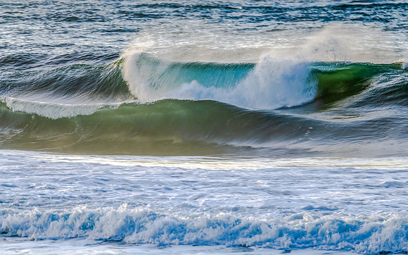 Sunrise and waves at the seaside
