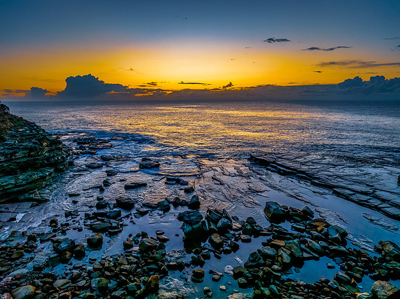 Sunrise sea views and rocky inlet