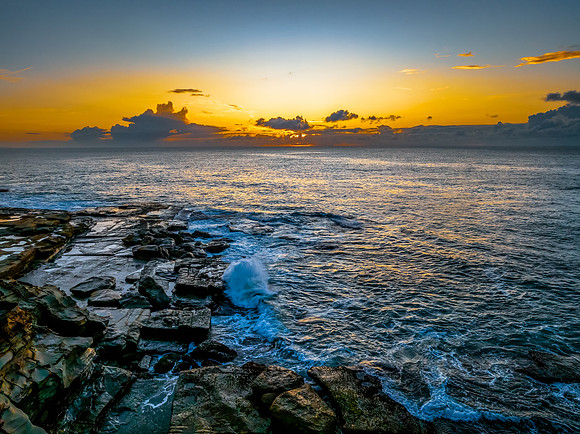 Sunrise sea views and rocky inlet
