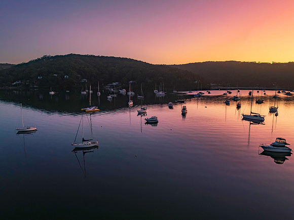 Sunrise waterscape over the bay nestled at the foot of the mount