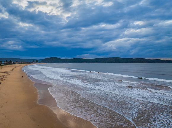 Sunrise seascape with low clouds