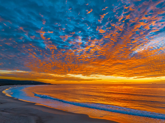 Sunrise at the seaside with beautiful cloudcover