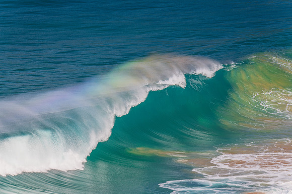 Rainbow light in the Waves at Whale Beach