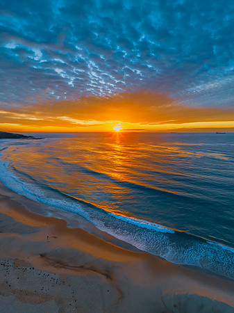 Sunrise at the seaside with beautiful cloudcover