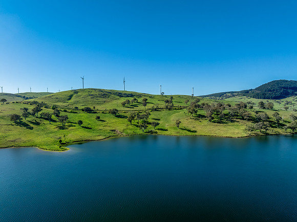 Aerial scenic views over Carcoar Dam with blue sky