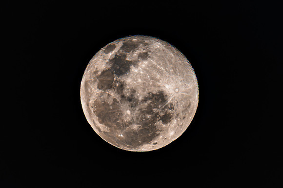 Cloud‑Covered Night Sky and the Full Moon