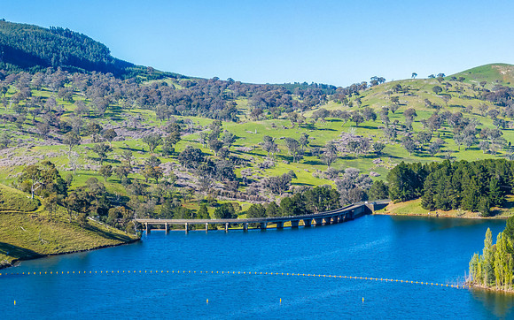 Aerial scenic views over Carcoar Dam with blue sky