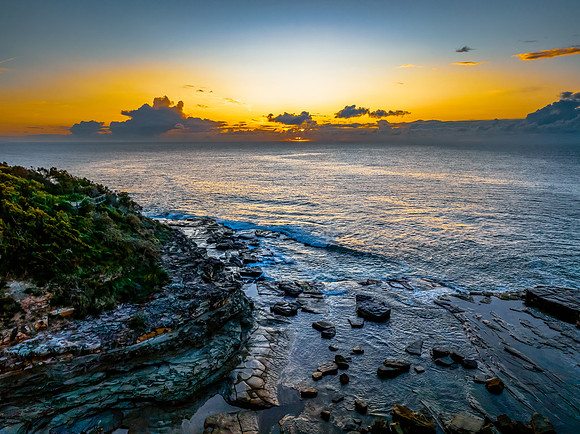 Sunrise sea views and rocky inlet