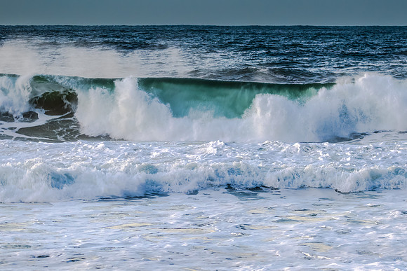 Sunrise and waves at the seaside
