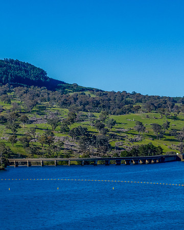 Aerial scenic views over Carcoar Dam with blue sky