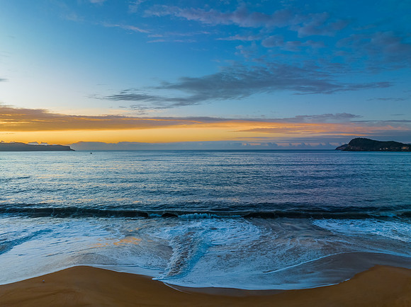 Aerial sunrise seascape with high cloud