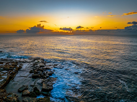 Sunrise sea views and rocky inlet