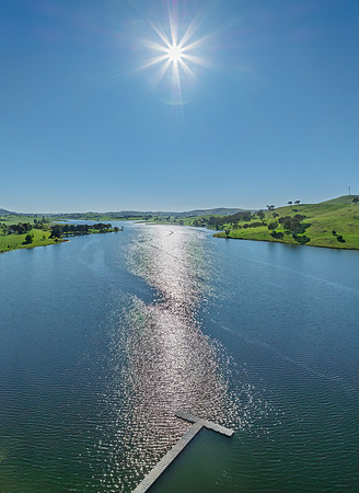 Aerial scenic views over Carcoar Dam with blue sky