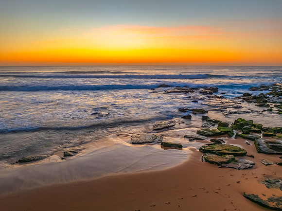 Sunrise at the Seaside with an Orange Horizon