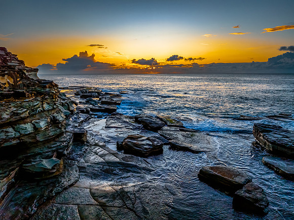 Sunrise sea views and rocky inlet