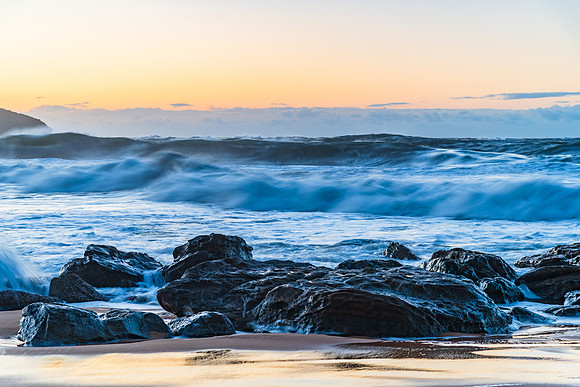 Sunrise and Waves - Surf's up at the seaside