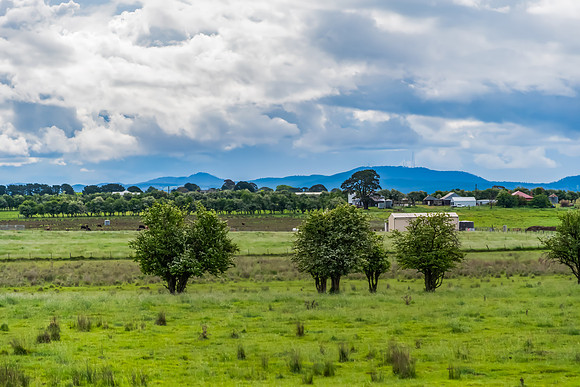 Spring landscape in the countryside with rain clouds