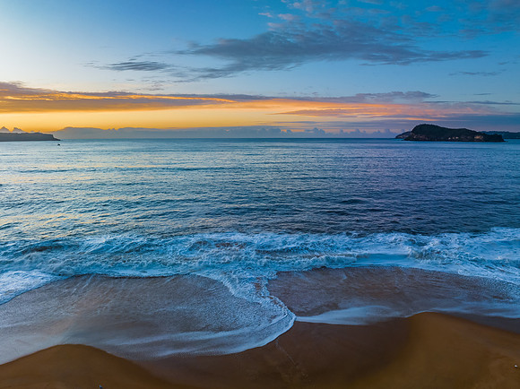 Aerial sunrise seascape with high cloud