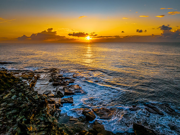 Sunrise sea views and rocky inlet