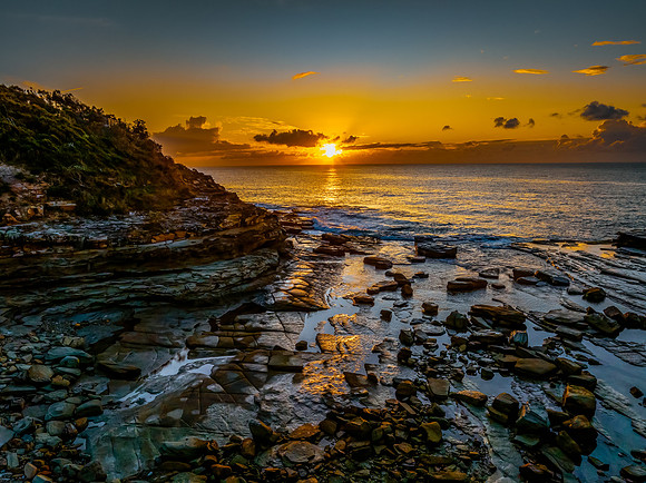 Sunrise sea views and rocky inlet