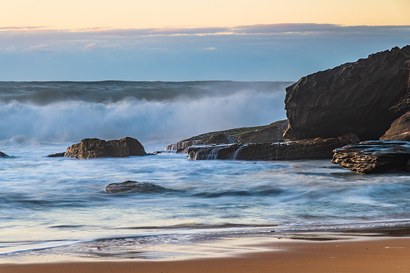 Sunrise and Waves - Surf's up at the seaside