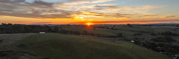 Soft Evening Light and High Cloud Over the Country Landscape
