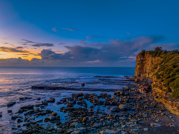 Sunrise sea views and rocky inlet