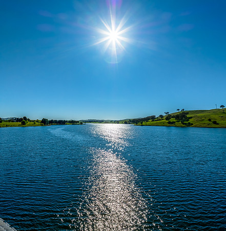 Aerial scenic views over Carcoar Dam with blue sky
