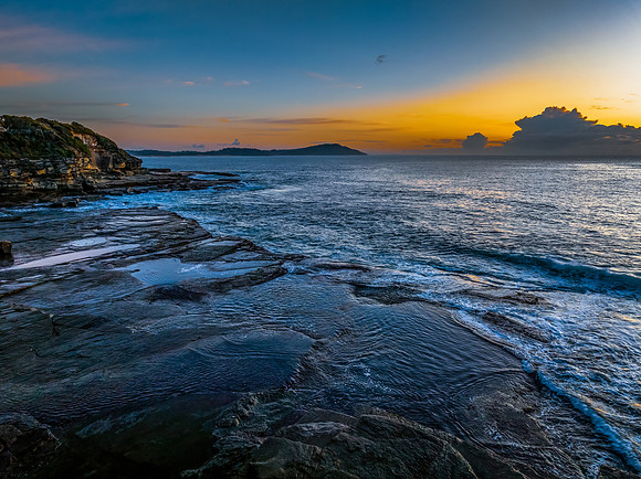 Sunrise sea views and rocky inlet