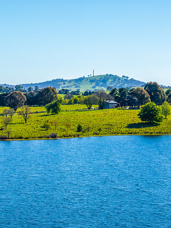 Aerial scenic views over Carcoar Dam with blue sky