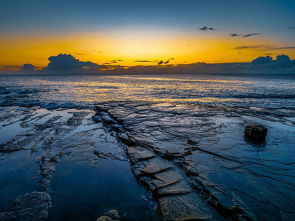 Sunrise sea views and rocky inlet