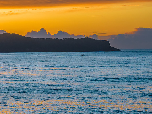 Aerial sunrise seascape with high cloud
