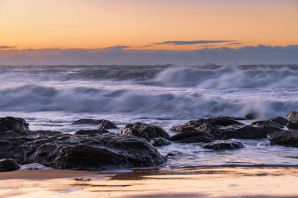 Sunrise and Waves - Surf's up at the seaside