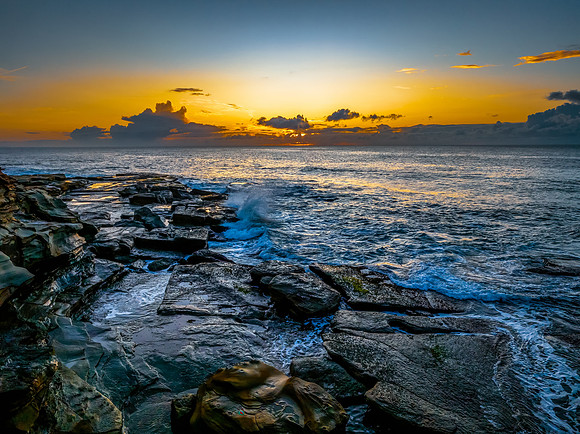 Sunrise sea views and rocky inlet