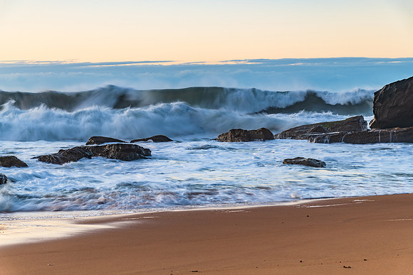 Sunrise and Waves - Surf's up at the seaside